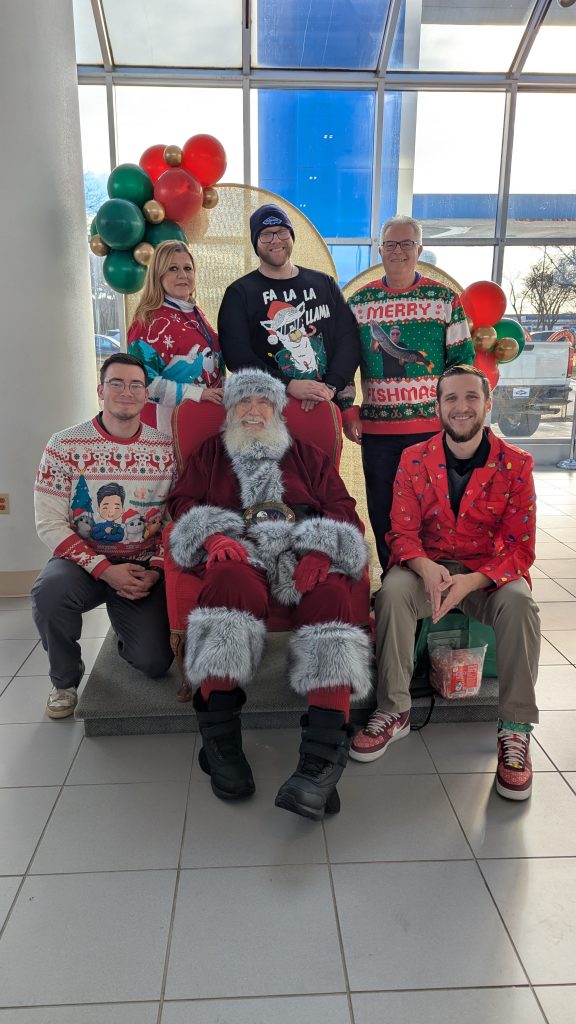Group of Bachrodt On State employees with Santa Claus.